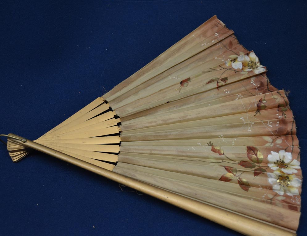 a%20wooden%20hand%20fan%20with%20silk%20and%20an%20ivory%20floral%20pattern